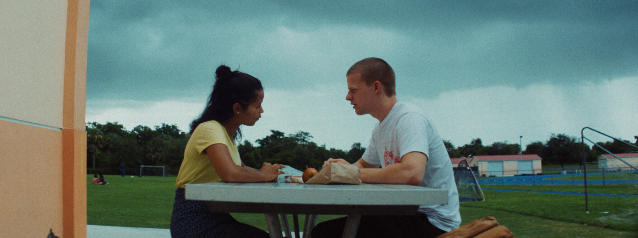 Taylor Russell as Emily, Lucas Hedges as Luke.